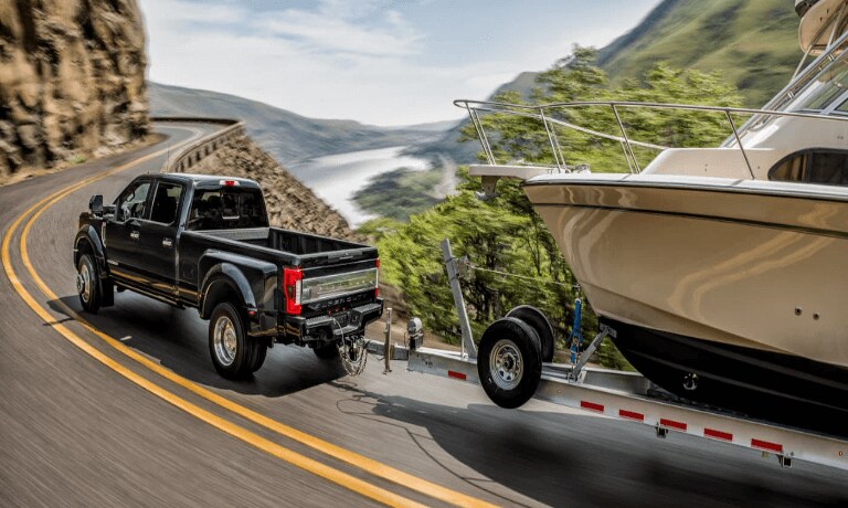 2021 Ford F-250 driving through a river