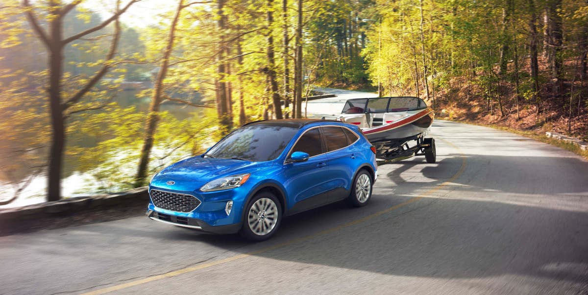 2020 Ford Escape towing a boat