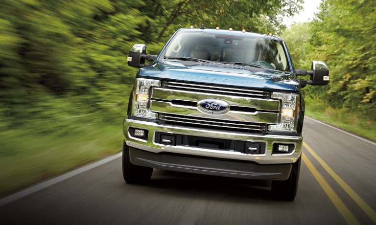2021 Ford Superduty driving on a forest road