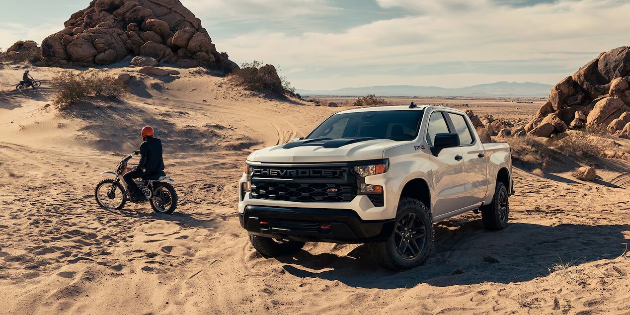 Chevrolet Silverado Crew Cab Short Bed Custom Trailboss in Summit White, built to conquer any terrain with its robust design and capabilities.