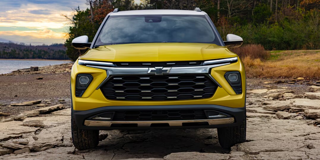 Nitro Yellow Metallic / Summit White Chevy Trailblazer SUV Parked at Lakeside