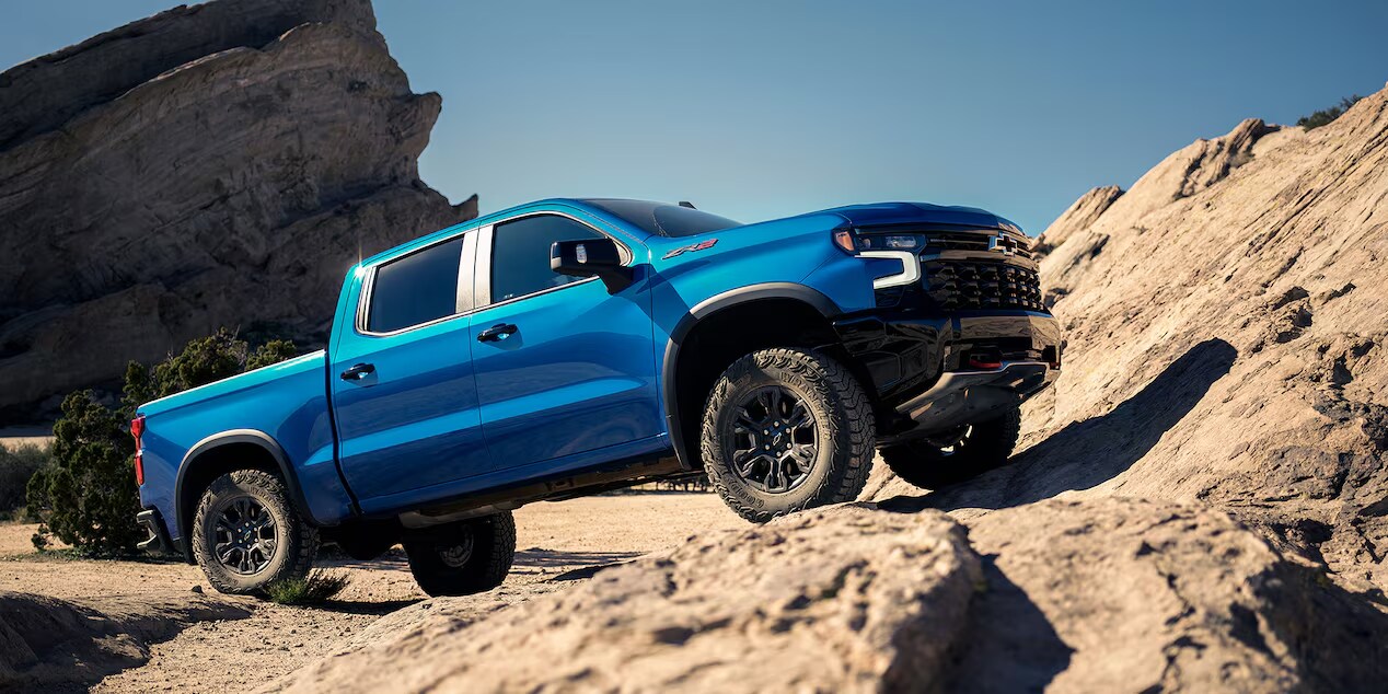 A rugged Glacier Blue Metallic Crew Cab Chevrolet Silverado ZR2, built to conquer any terrain with its robust design and capabilities.