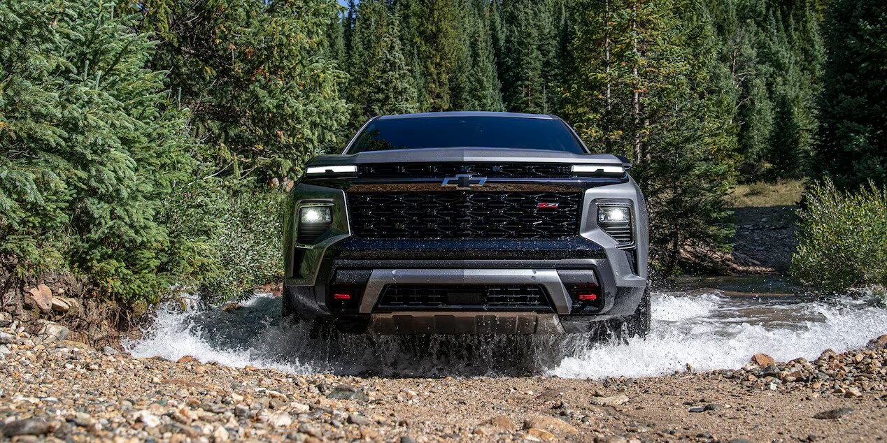 2024 Chevy Traverse Head-On View Driving Through a Puddle