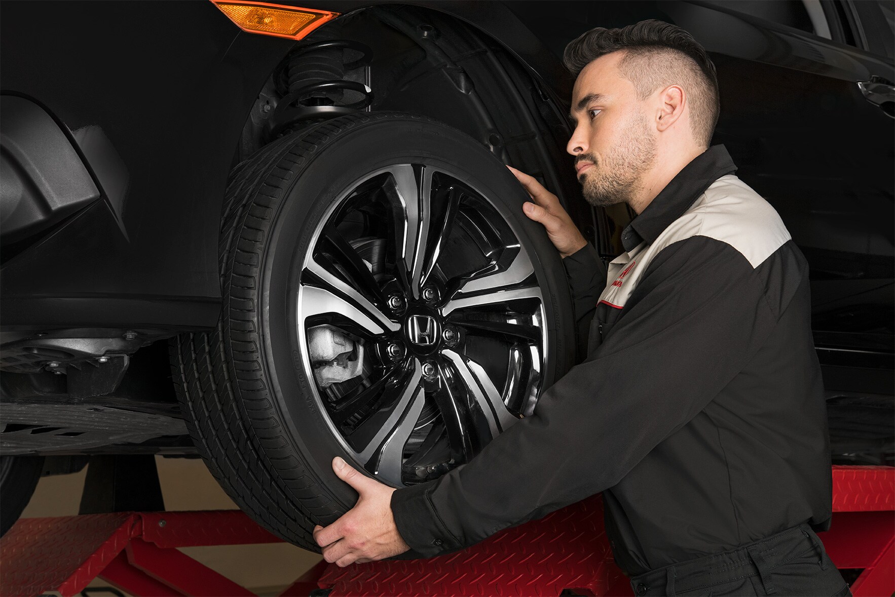 PartsServiceShoot.InspectingTire.jpg