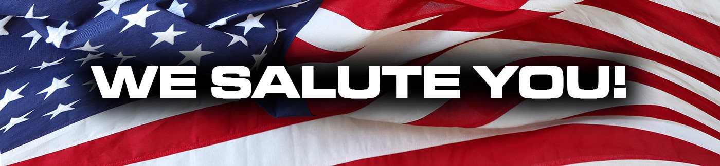 We Salute You in front of a American Flag banner We Salute You! at Robert DCJR