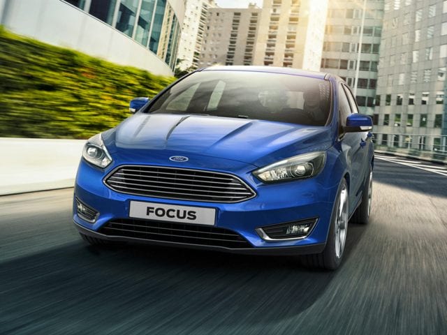 2018 Ford Focus hatchback blue in city.jpg