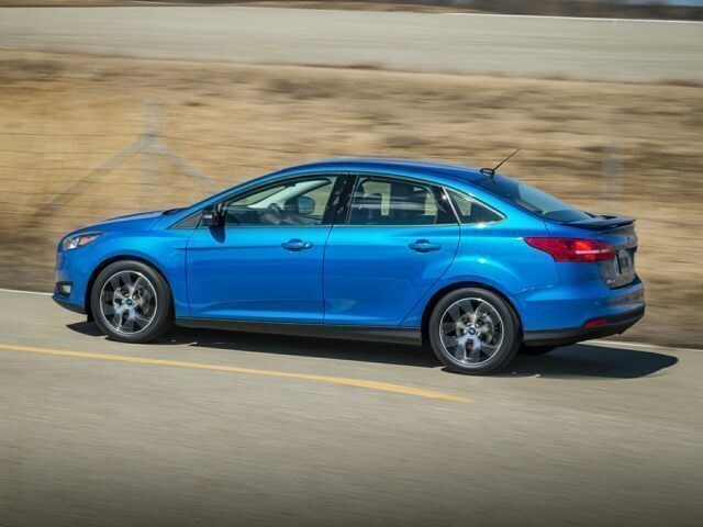 2017 Ford Focus sedan blue in motion.jpg