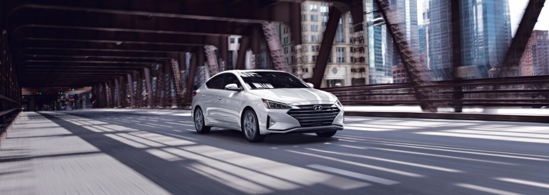 White Hyundai Elantra front passenger side view