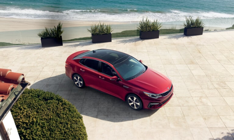 2020 Optima Parked Next to a Villa by the Beach