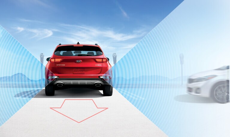 2020 Kia Sportage rear view with side collision sensors