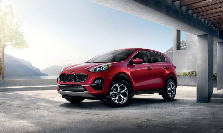 2020 Kia Sportage parked by an office building next to a lake