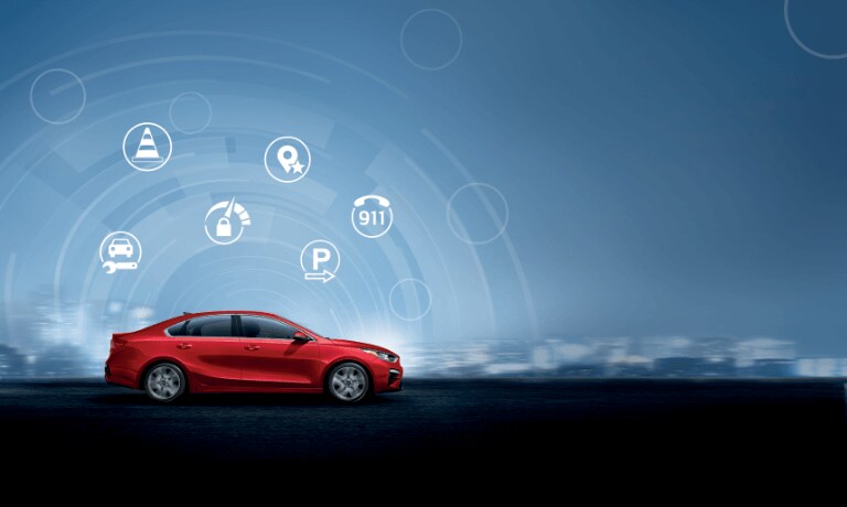 2020 Kia Forte in red Showing safety icons floating on top of the vehicle