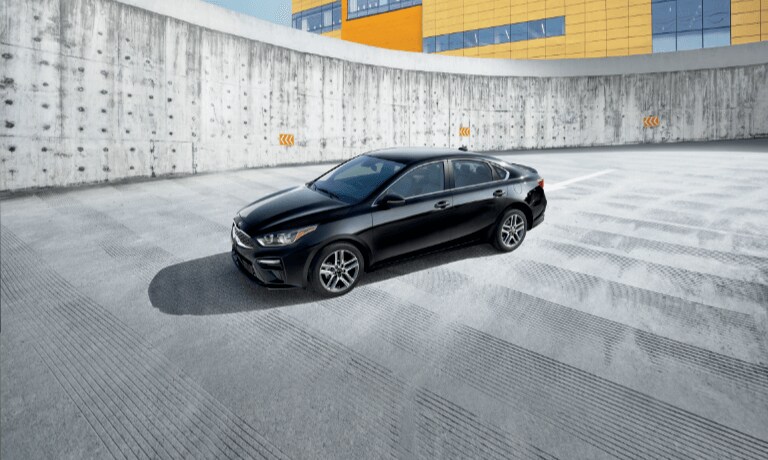 2020 Kia Forte in Black Parked on the upper level of a parking garadge