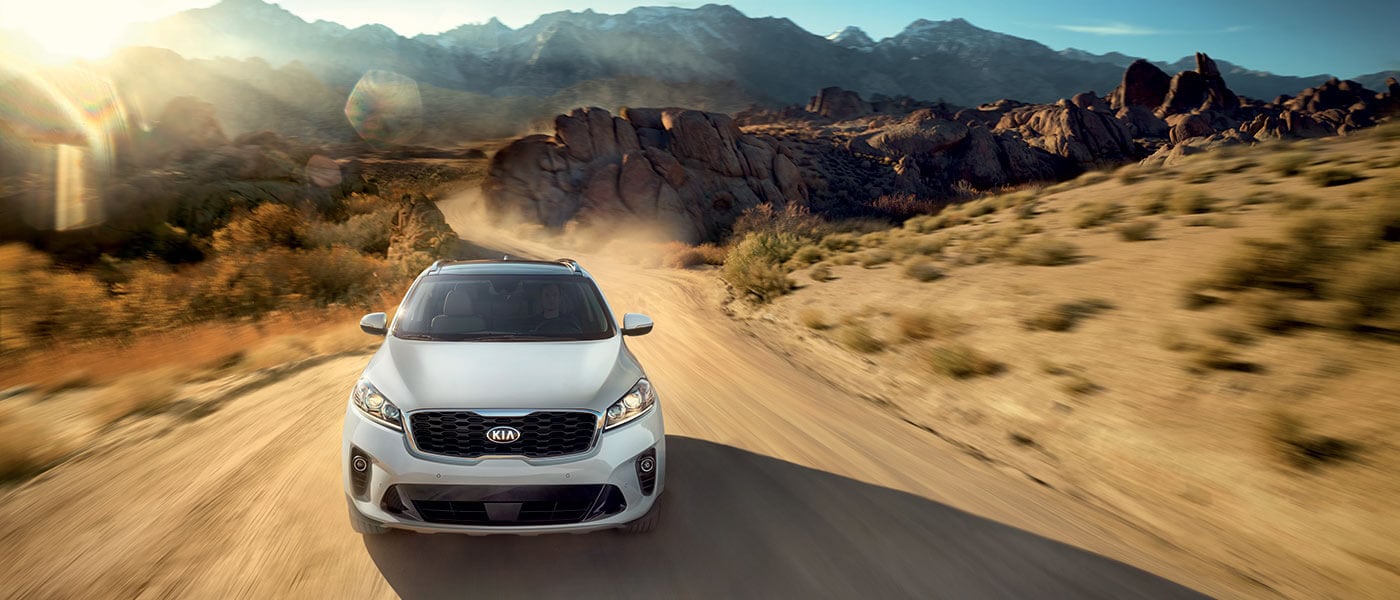 Grey 2019 Kia Sorento driving in desert
