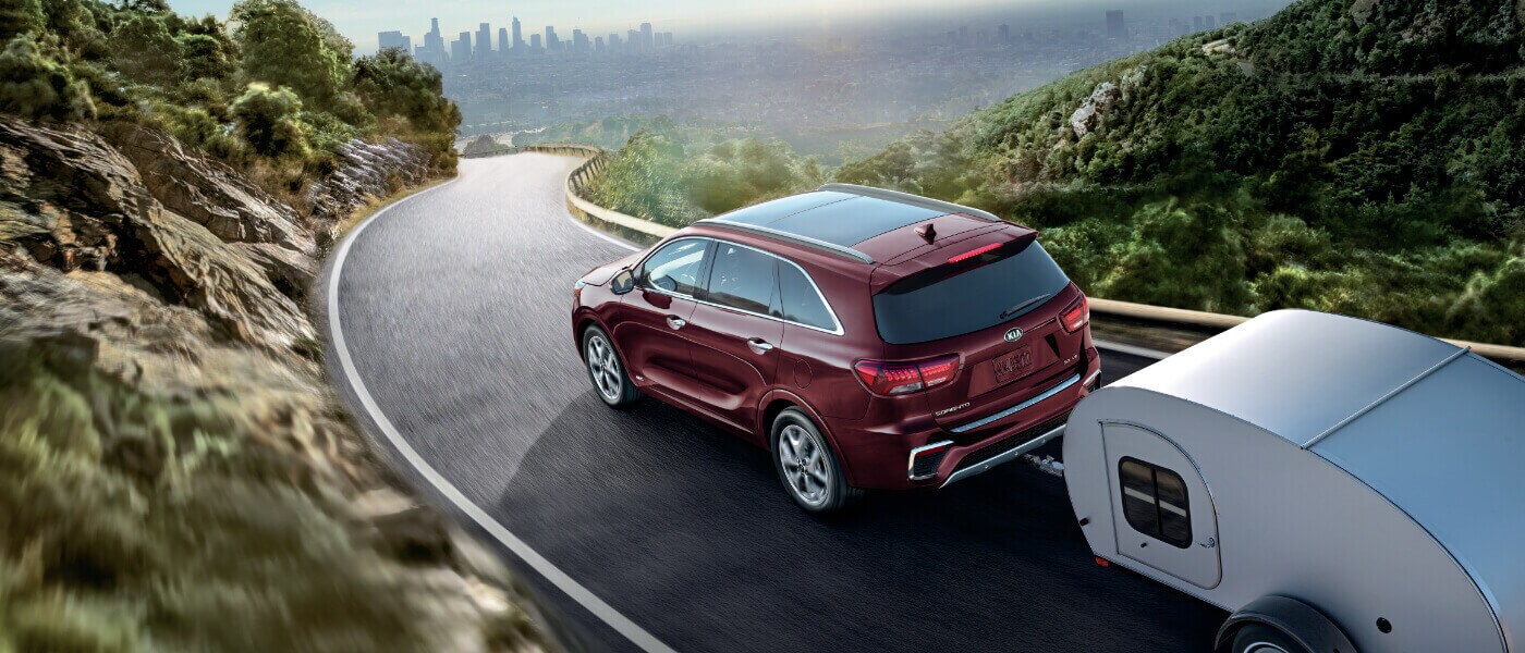 2020 Kia Sorento A red 2020 Kia sorento towing a camper