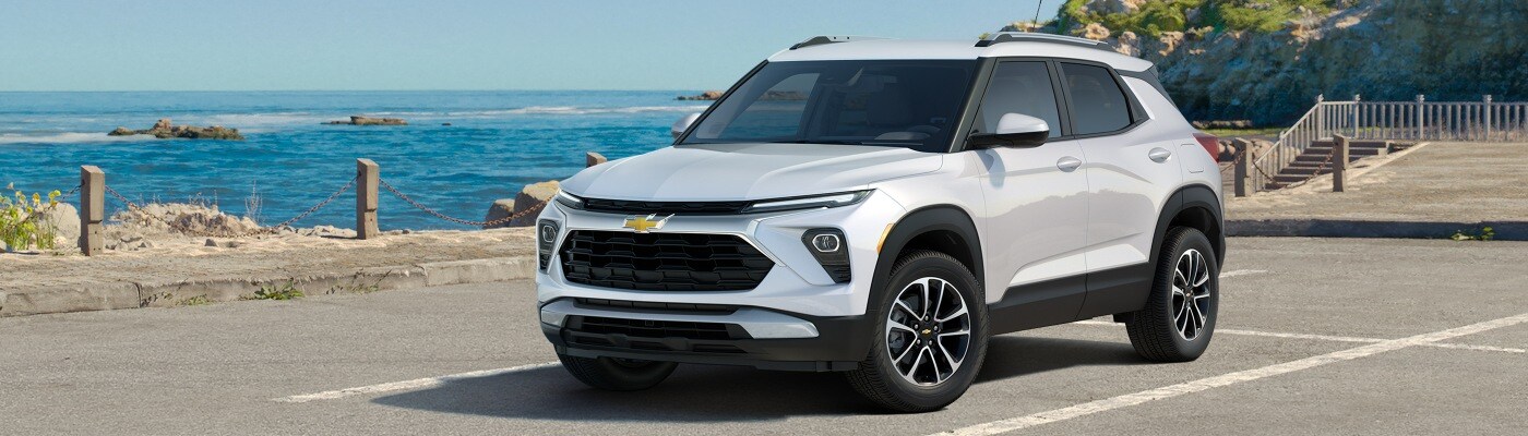 2025 Chevy Trailblazer White Chevy Trailblazer parked by a rocky beach