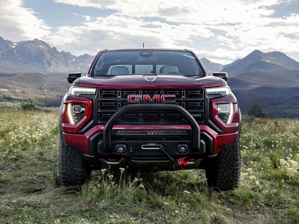 Front view of the 2026 GMC Canyon in a vibrant color.