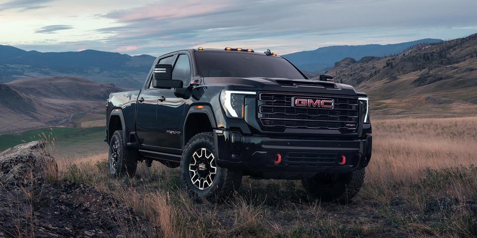 Exterior view of the 2026 GMC Sierra 2500 HD in a rugged setting.