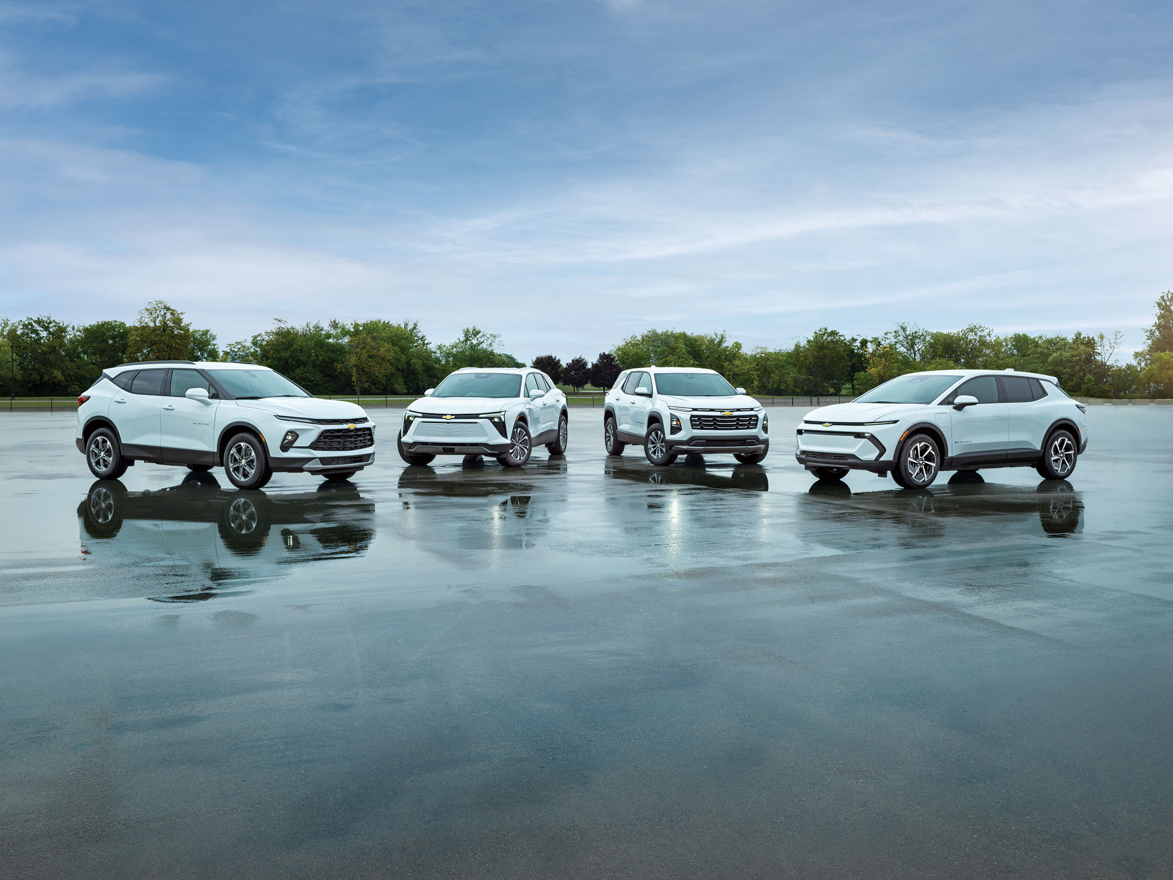 Chevrolet Equinox driving confidently on a snow-covered Illinois road, showcasing its AWD capability