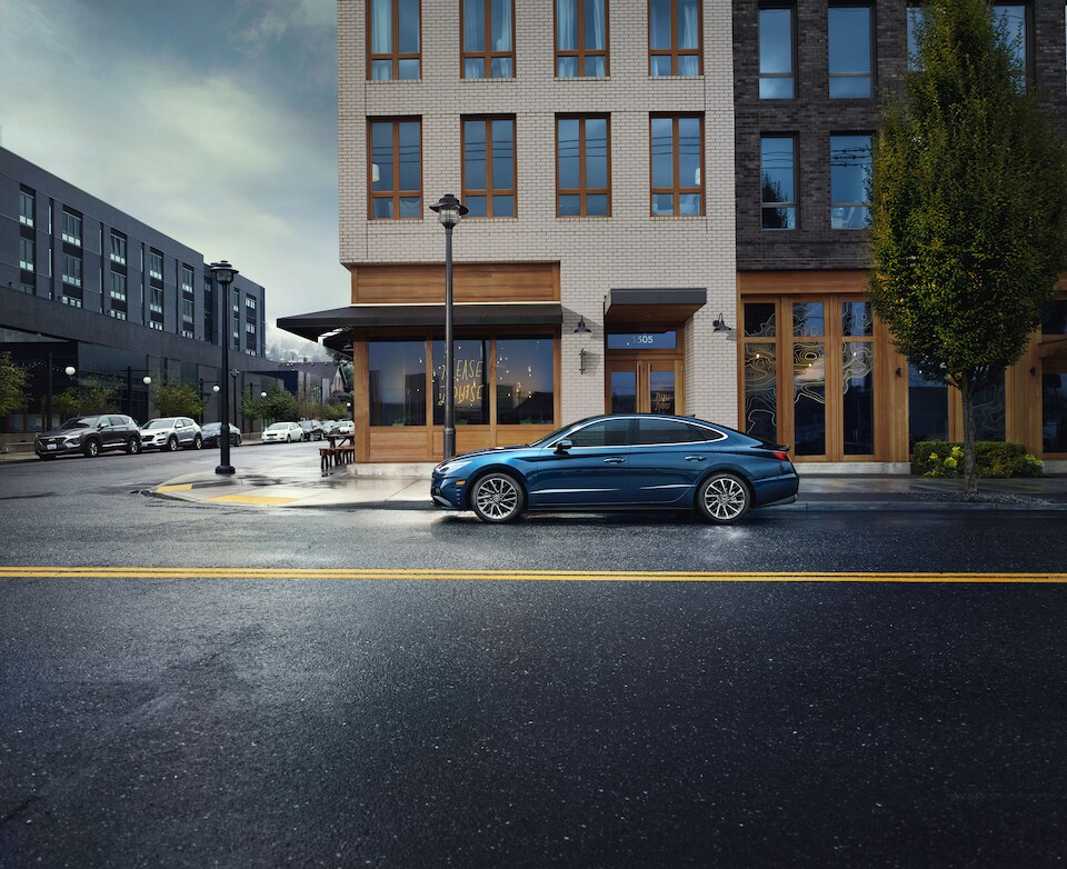 2020-Hyundai-Sonata-Limited-Sedan parked on upscale city corner.jpeg