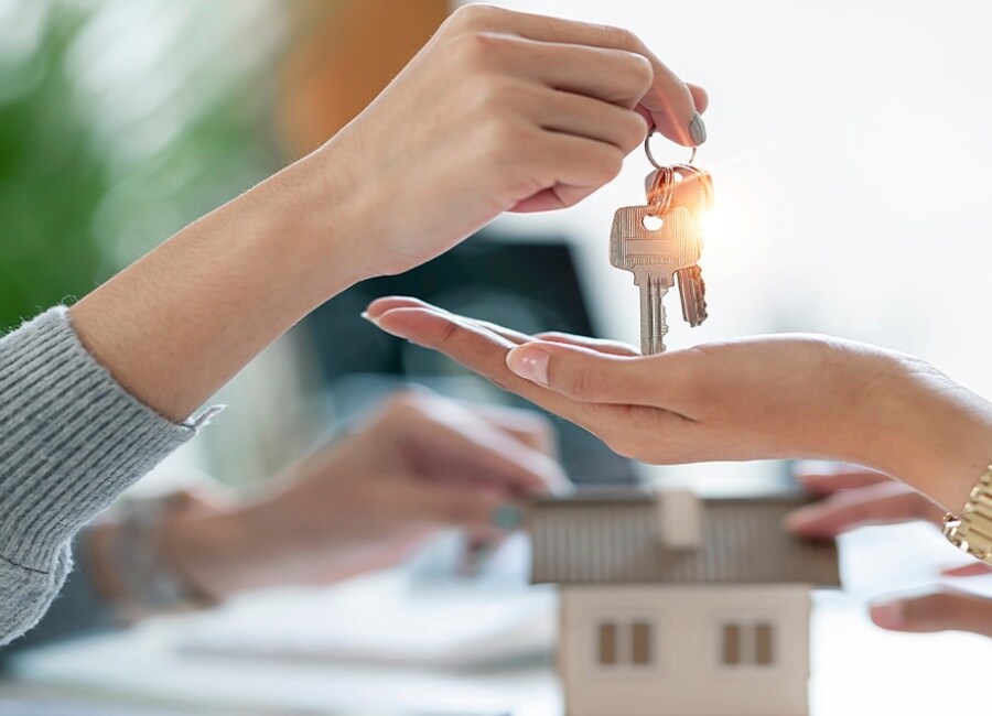 Person handing keys