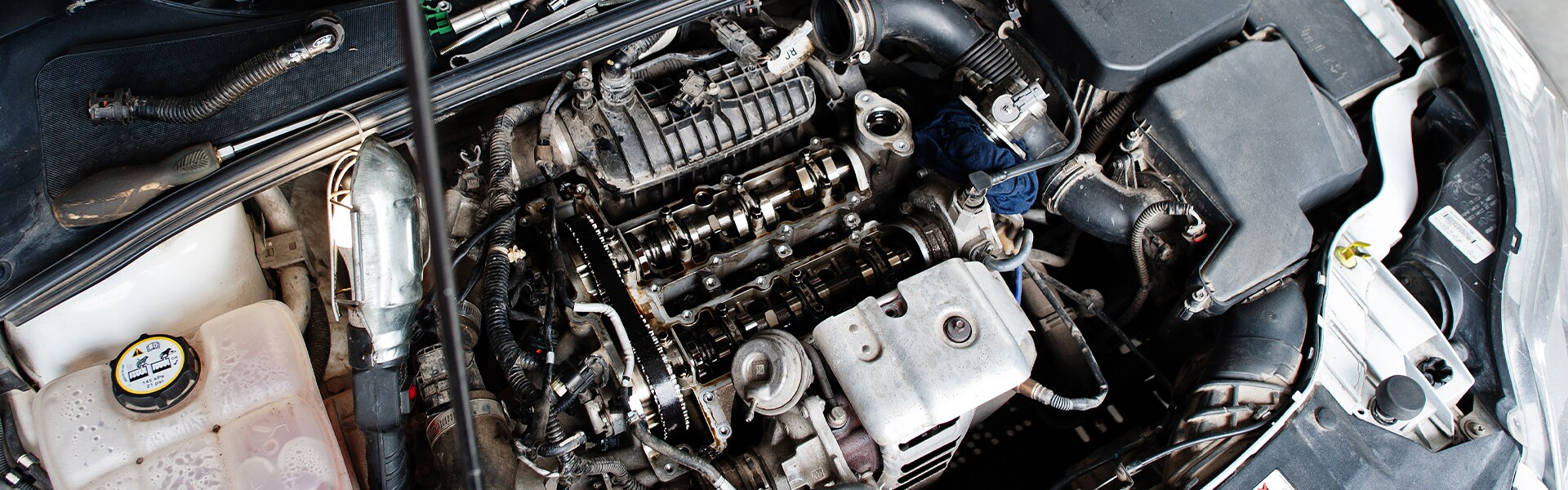 Benefits of Changing Your vehicle’s Oil at Sale Auto Mall in Kinston | Car Engine Overhead View
