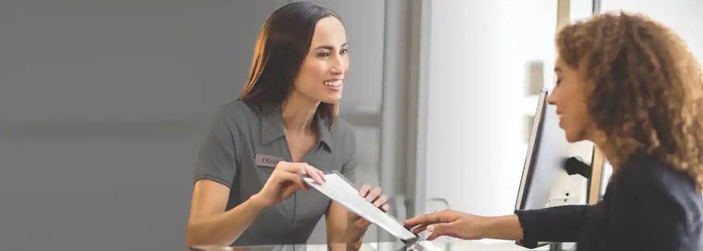 Two Women Discussing Ford Credit