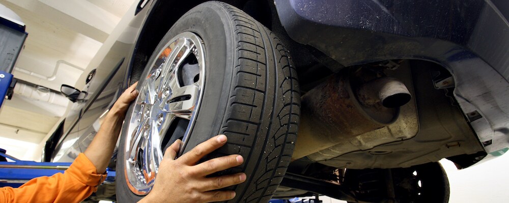 technician changing tire