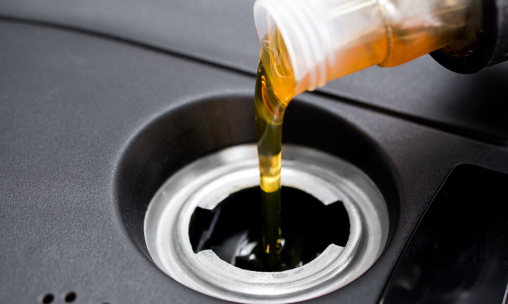 Adding oil to engine