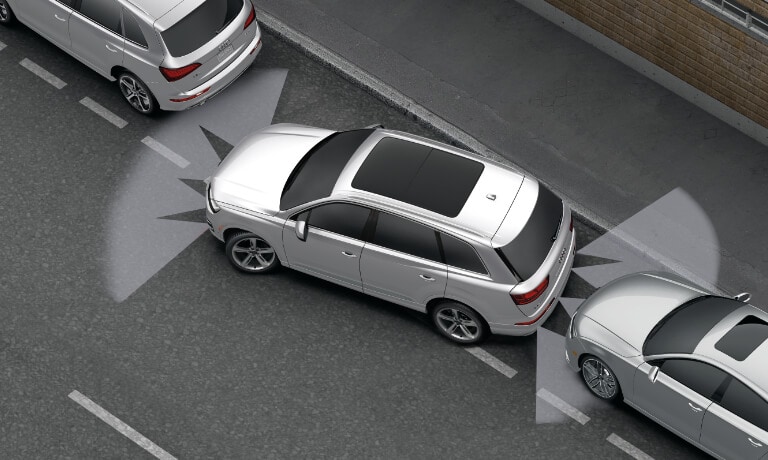 2020 Audi Q7 pulling out of a parallel park with collision sensors