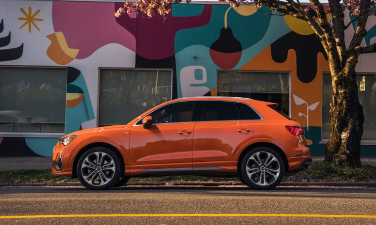 2020 Audi Q3 parked on the street in front of a street mural