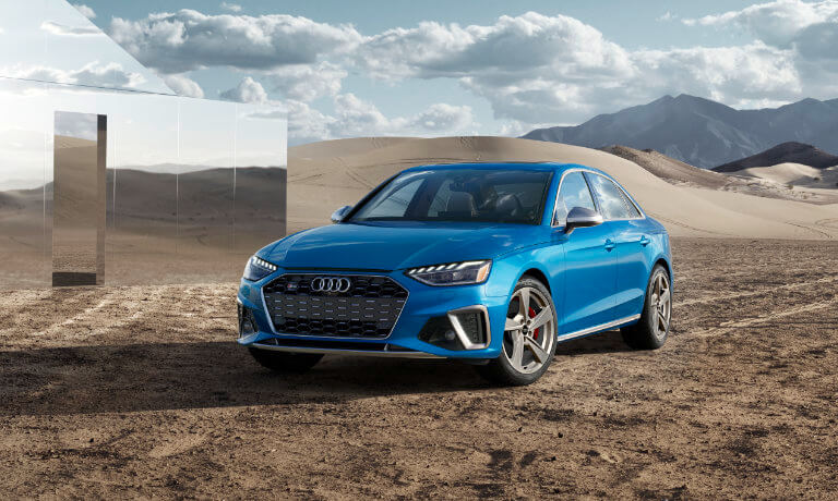 2021 Audi S4 exterior in field in front of mirror structure