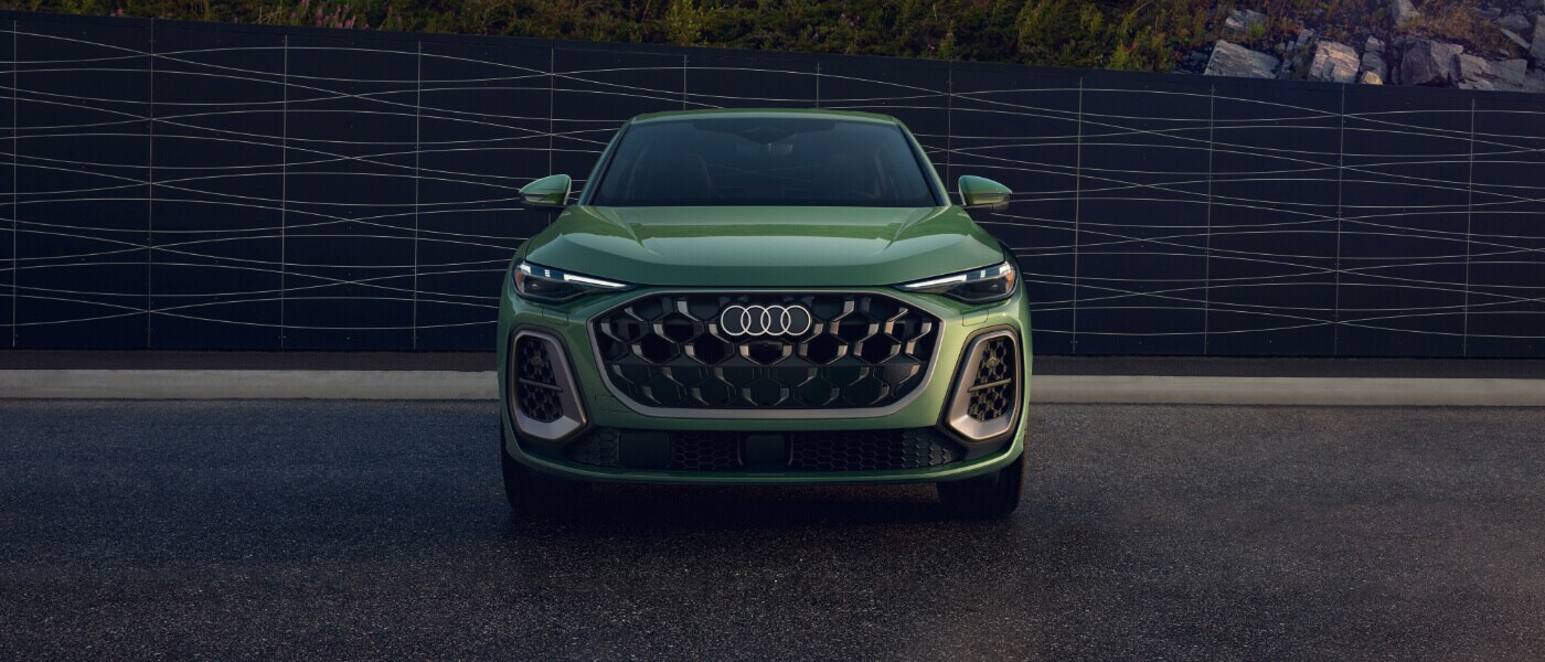 2025 Audi Q5 Sportback Exterior Parked Head On By Wall
