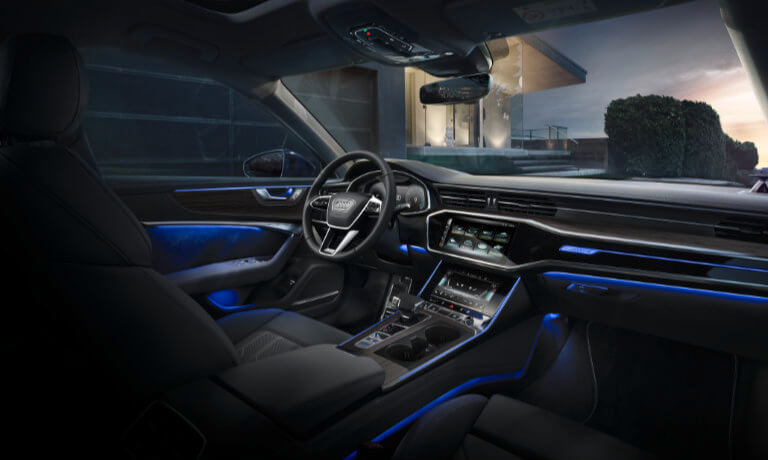 2023 Audi A6 Interior front seat and dash with blue lights