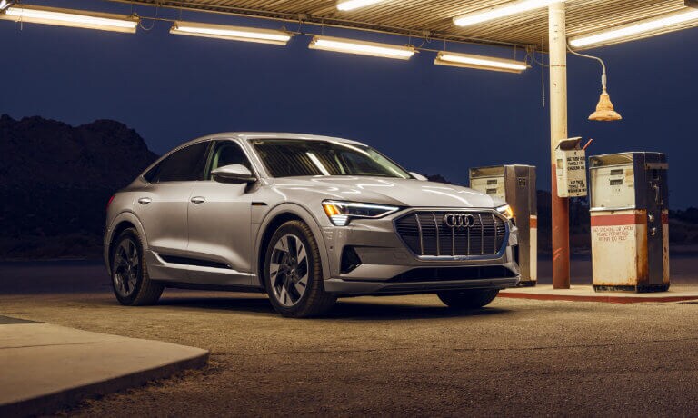2022 Audi e-tron® Sportback exterior at old gas station