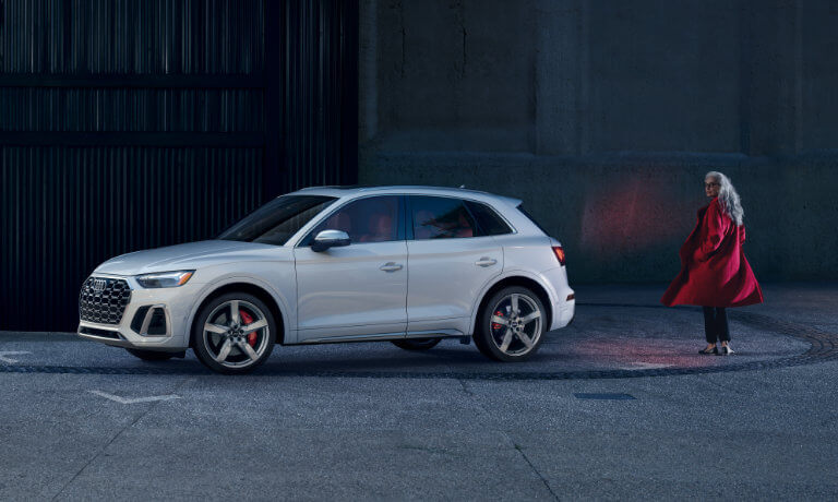 2022 Audi SQ5 exterior with woman walking behind