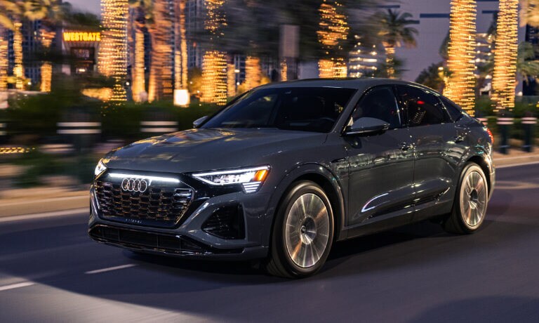 2024 Audi Q8 e-tron exterior city street at night