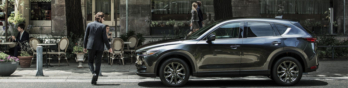 New Gray MAZDA CX-5 Parked On Street