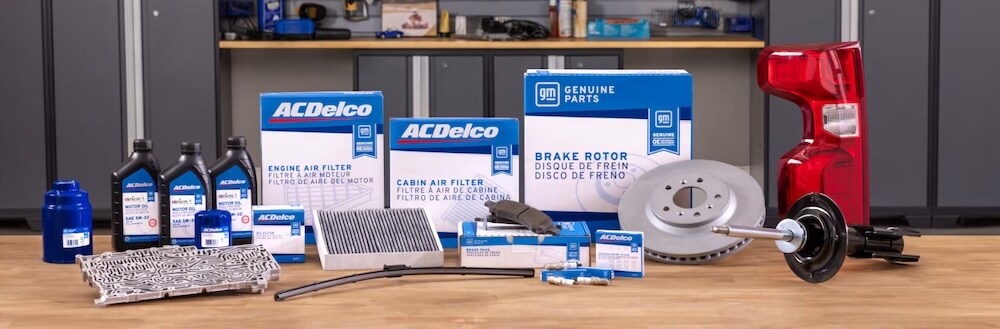 A selection of GMC and ACDelco car parts arranged on a table A selection of GMC and ACDelco car parts arranged on a table