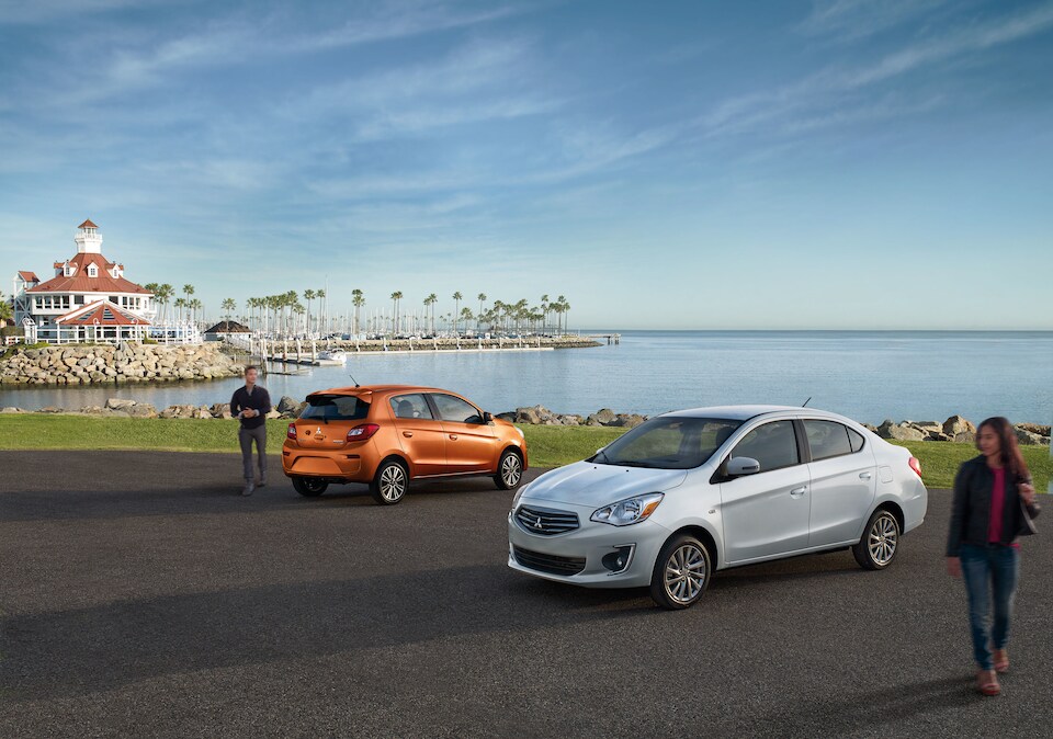 2018 Mitsubishi cars and drivers parked by water.jpeg