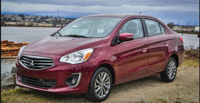 2019 Mitsubishi Mirage G4 sedan by water and cityscape_2.PNG