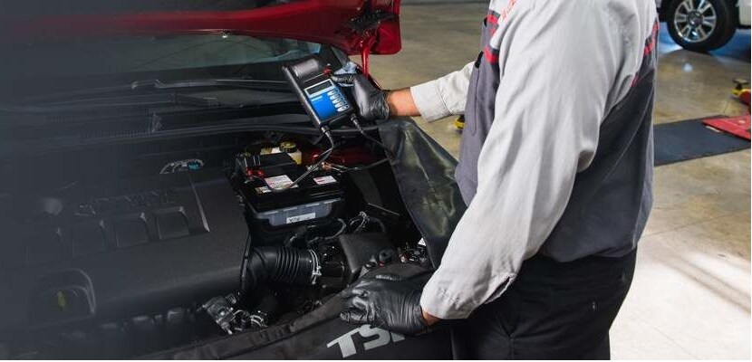 ToyotaService-man-with-handheld-monitor.png