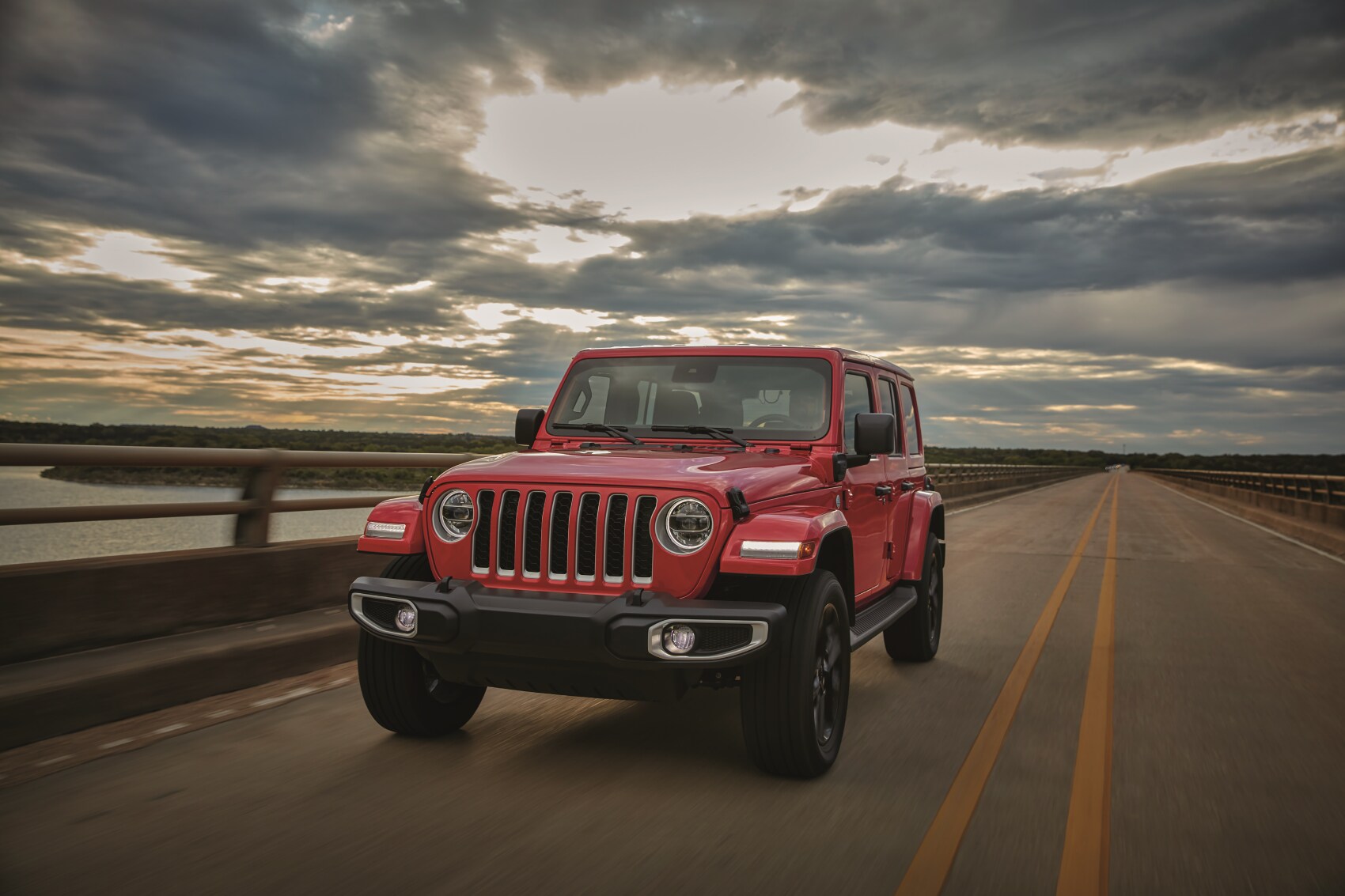 Jeep Wrangler driving on bridge