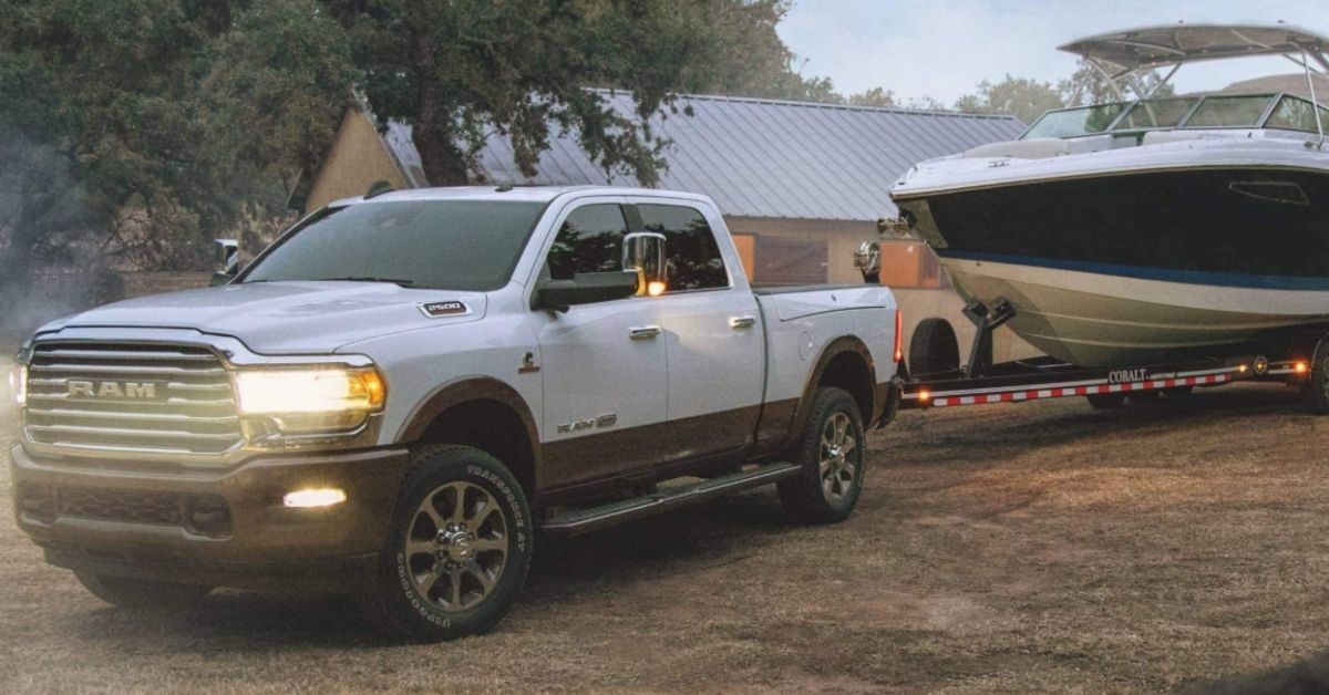 White 2021 RAM 2500 Hauling A Boat.jpg