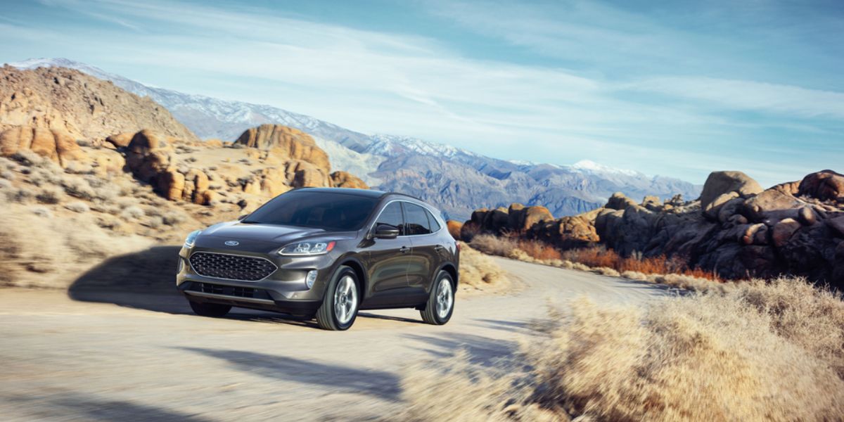 2021 Ford Escape Titanium SUV driving mountains_long.jpeg