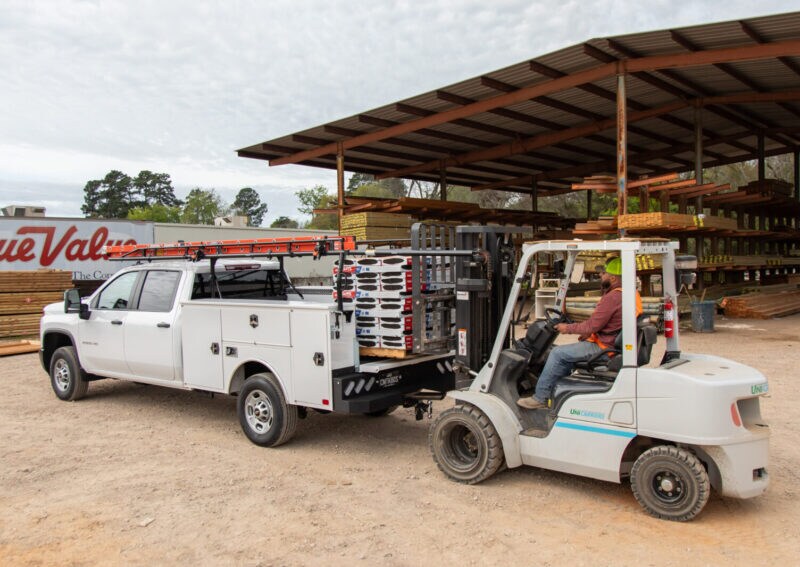 Service body truck loading at a lumber yard