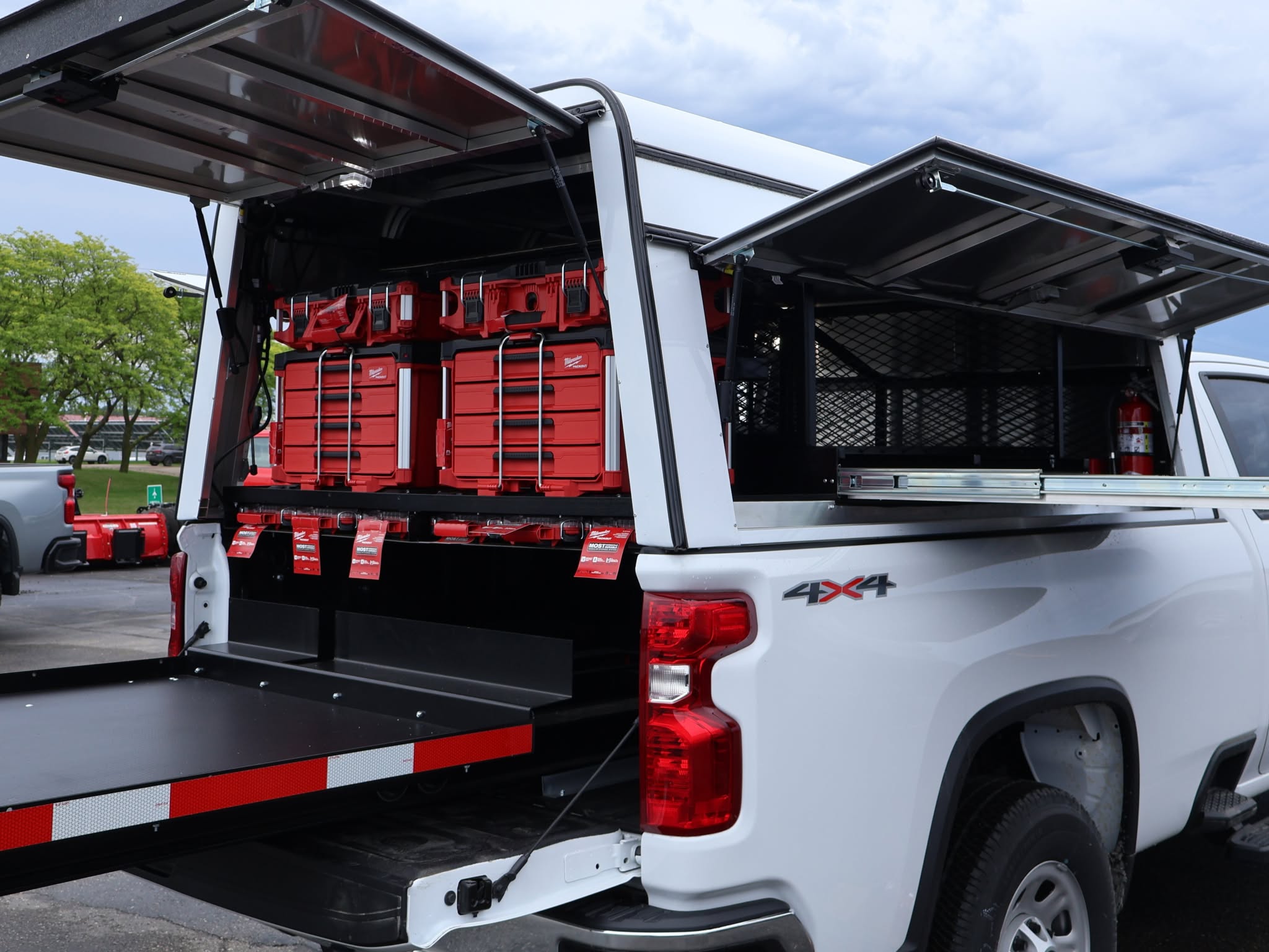 Work truck outfitted with an Extendobed slide-out and Milwaukee tool storage