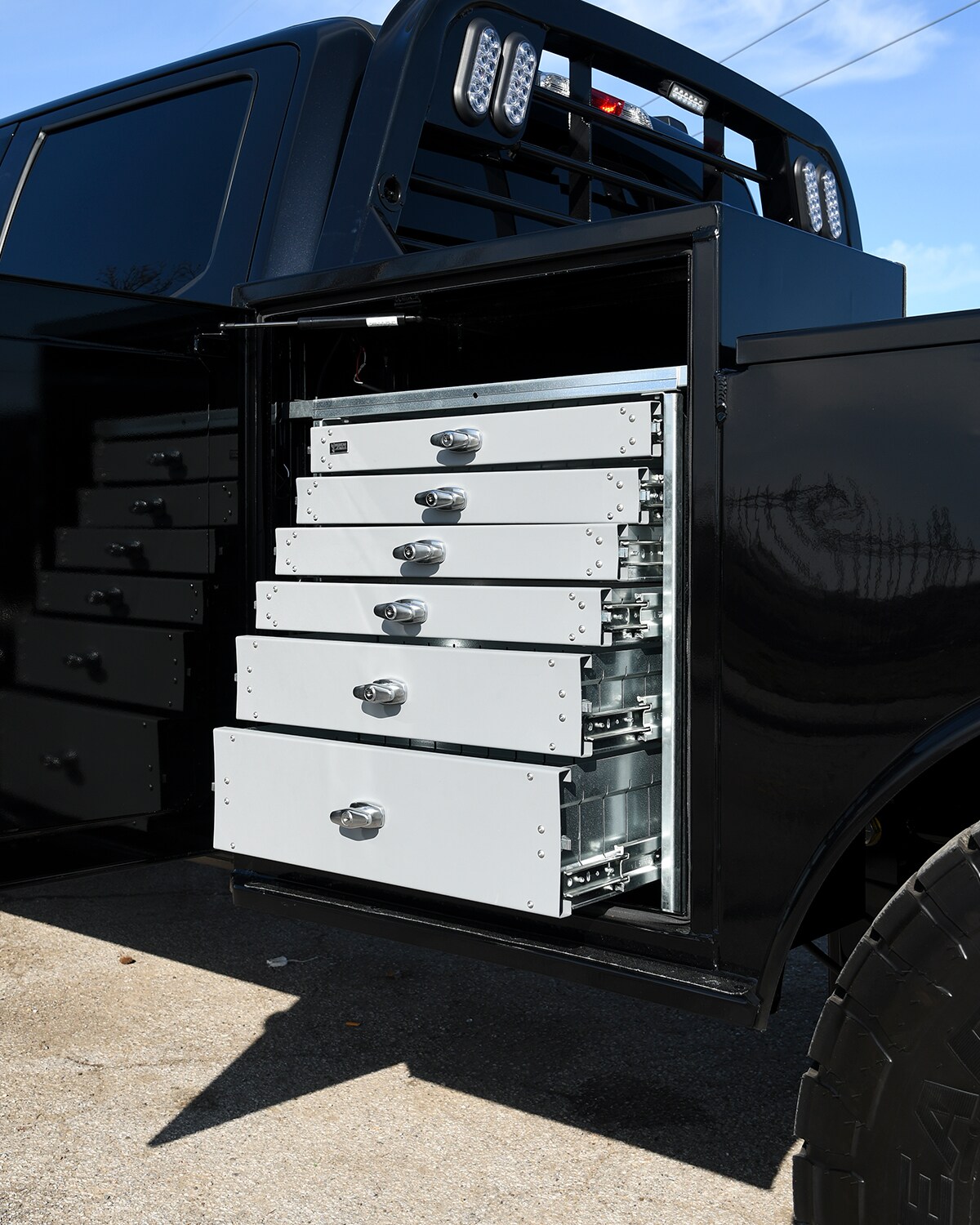 Slide-out drawers in a CM service body compartment