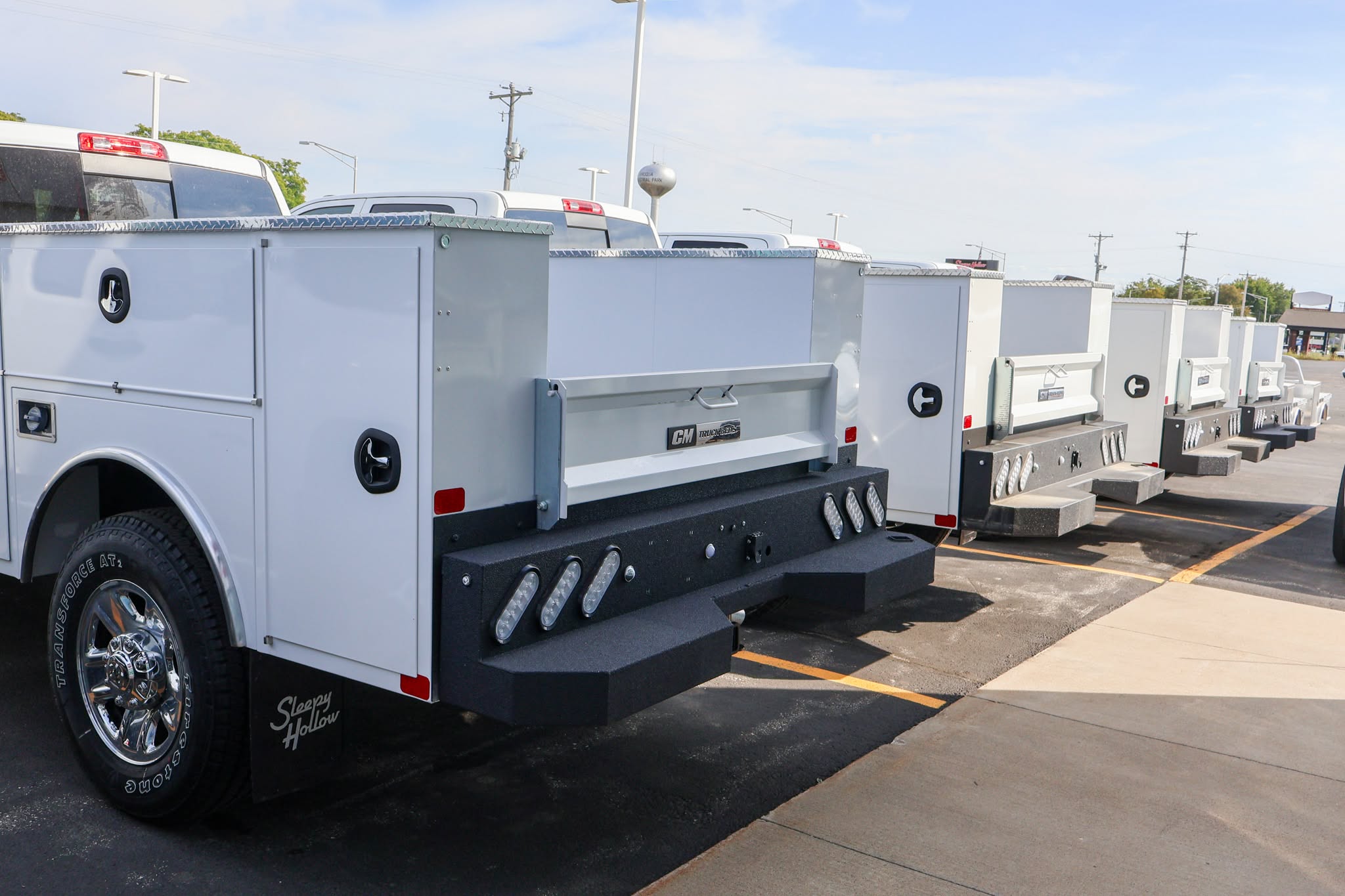 Lineup of CM service bodies at Sleepy Hollow Commercial Truck Center