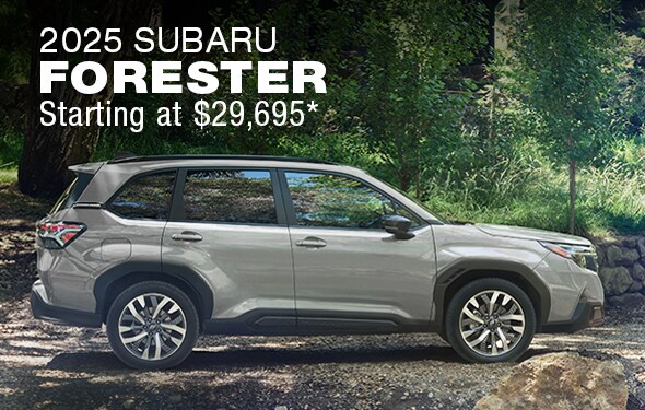 Side profile of a 2025 Subaru Forester parked on a dirt road